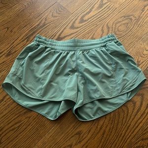 Dark green lululemon hotty hot shorts 4 inch